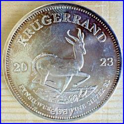 2023 South Africa Silver Krugerrand R1 1 oz BU. Natural Toning