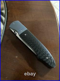 Andre Thorburn Model L19 Custom Knife. Carbon Fiber Red Liner Anodized Titanium