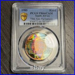 PR66CAM 1985 South Africa Silver Proof Rand, PCGS Trueview- VIVID Rainbow Toned