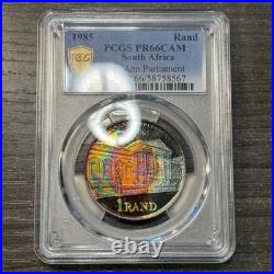 PR66CAM 1985 South Africa Silver Proof Rand, PCGS Trueview- VIVID Rainbow Toned