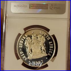 SEE VIDEO toning 1987 South Africa Silver 1 Rand NGC PF67 springbok GOLD toned