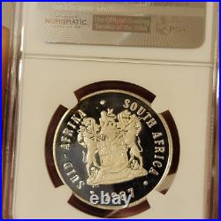 SEE VIDEO toning 1987 South Africa Silver 1 Rand NGC PF67 springbok GOLD toned