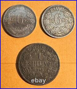 South Africa 1895 Shilling, 1895, 1897 6 Pence Silver Coins, Lot Of (3)