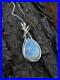 Wire_wrapped_moonstone_pendant_argentium_silver_jewelry_necklace_01_buj